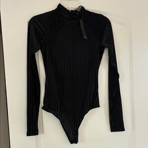 Lulu's Black Ribbed Mesh and Suded Long Sleeve Open Back Bodysuit